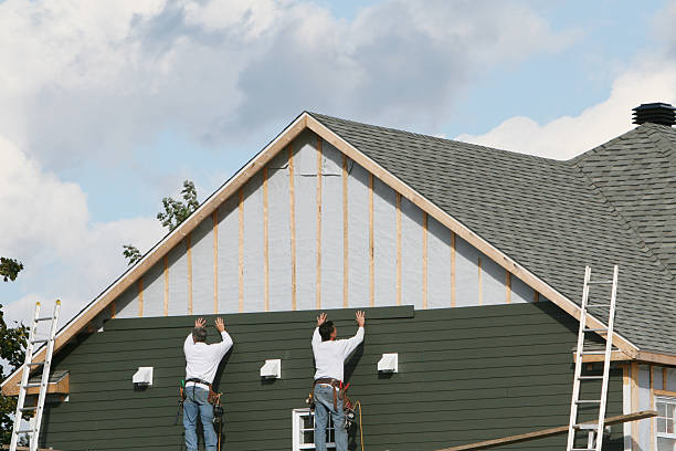 Professional Siding Installation technician working in Montgomery, PA